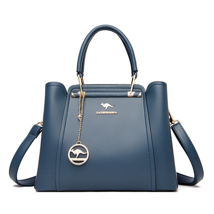 Elevate your style with this exquisite leather handbag, featuring intricate craftsmanship and timeless elegance.